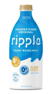 A bottle of Ripple pea milk with a beige label, featuring the brand name in bold letters and a clean, modern design.