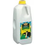 "A half-gallon carton of Kemps 1% lowfat milk with a blue label, featuring the Kemps logo and an image of a farm scene in the background."